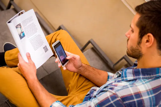 Man scanning QR code Print 