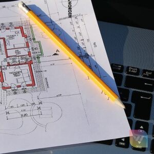 Laptop and building plans